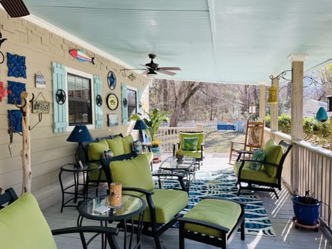 Enjoy our front covered patio with ceiling fans!
