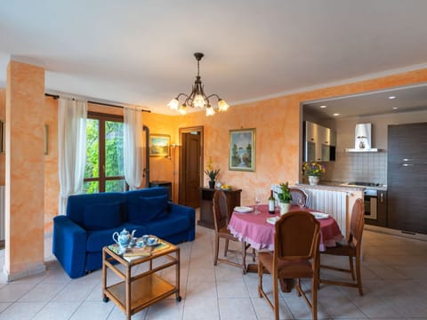 Water, Table, Tableware, Property, Sky, Furniture, Building, Window, Blue, Chair