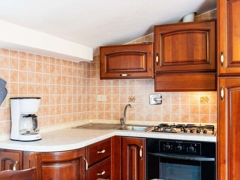 Kitchen, Countertop, Major Appliance, Wood, Cabinetry, Kitchen Appliance, Interior Design, Sink, Plumbing Fixture, Flooring