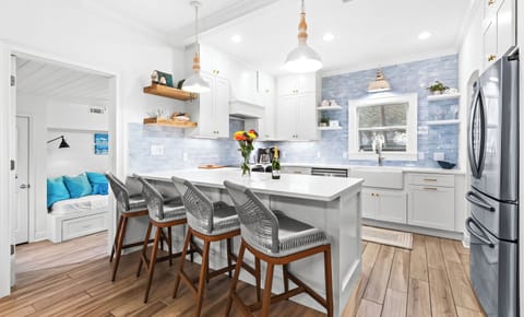 Your bright, modern kitchen features a spacious island