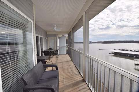 Enjoy our LARGE SCREENED in patio that overlooks the water and main channel