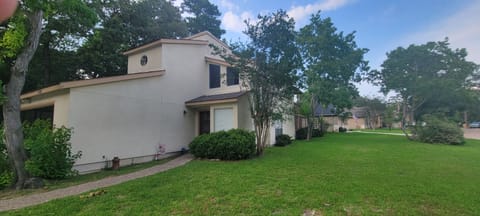 front of house, sits in corner 1/2 acres lot