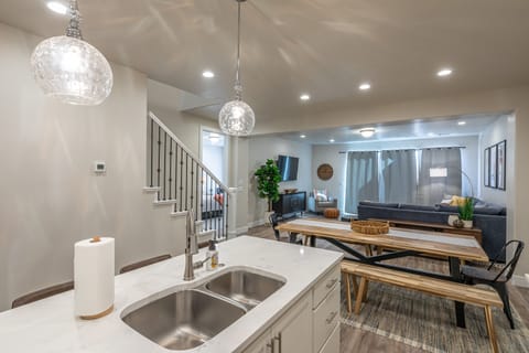 Kitchen View - The Kitchen Island comfortably seats 4 adults and creates a great space for serving and preparing meals.