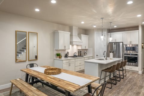 Dining Table - The beautiful wood dining room set can comfortably seat 8 people.