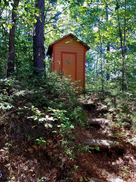 Charming outhouse for the adventurous.