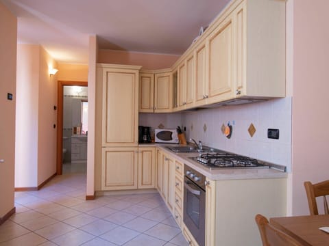 Property, Room, Furniture, Kitchen, Cabinetry, Countertop, Building, House, Interior Design, Floor