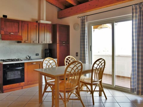 Furniture, Property, Cabinetry, Table, Chair, Countertop, Wood, Kitchen Appliance, Interior Design, Window