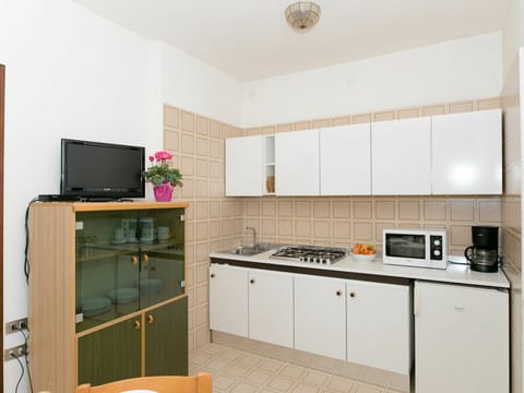 Room, Property, Furniture, Kitchen, Cabinetry, Interior Design, Building, Real Estate, Yellow, House