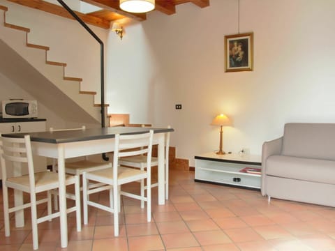 Furniture, Table, Property, Picture Frame, Wood, Couch, Lighting, Interior Design, Living Room, Orange