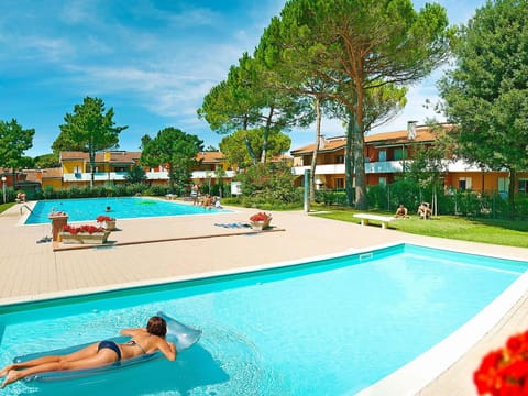 Water, Plant, Sky, Swimming Pool, Building, Cloud, Tree, Outdoor Furniture, Leisure, Shade