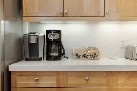 Kitchen features a Drip Coffee Maker and Keurig.