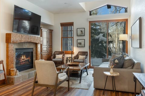 Living Room with Glass Doors to the Deck with River Views.