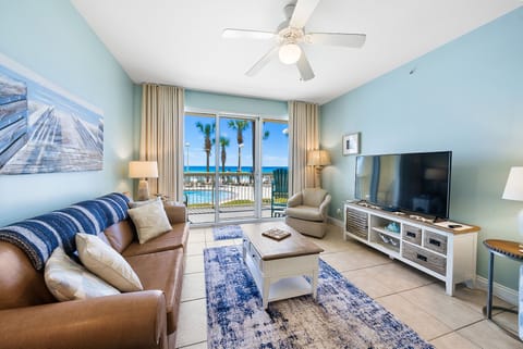Relax in your coastal living room where ocean breezes flow through and stunning sea views create the perfect backdrop for unwinding.