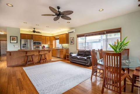 Open-concept living area & kitchen with pull out couch (different than pictured)