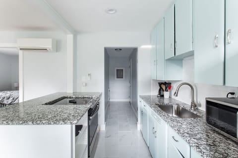 Clean and Cool Kitchen, with restored original "Well Built" vintage cabinets