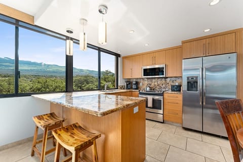 Corner unit provides surround views of both the  mountain and ocean.