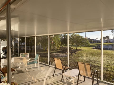 Plenty of seating on the screened patio. Can seat 8-10 for meals.