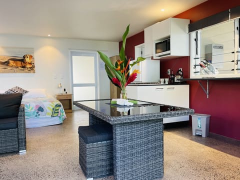 modern, island themed and catches the breeze from the lagoon as its that close!