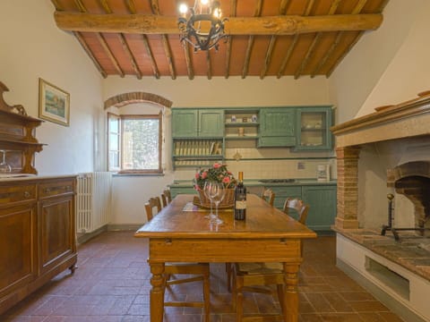 Cabinetry, Table, Furniture, Property, Window, Wood, Lighting, Interior Design, Houseplant, Floor