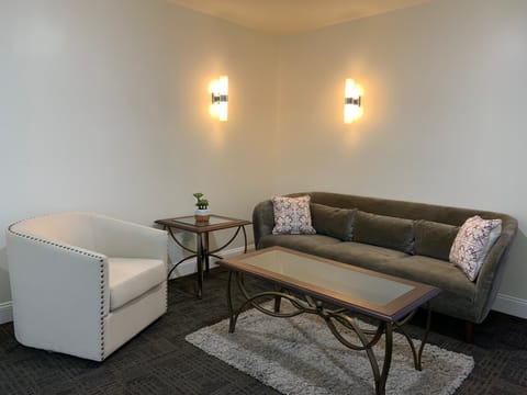 Bedroom Four - small living area 