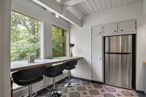 Seating area in the kitchen - also extra counter space for preparing meals.