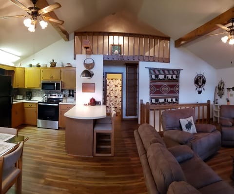 Fully stocked kitchen with peninsula for additional seating.