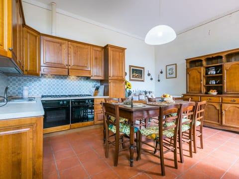 Furniture, Property, Cabinetry, Countertop, Wood, Interior Design, Kitchen, Flooring, Table, Floor