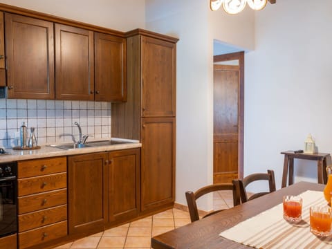 Furniture, Cabinetry, Property, Table, Sink, Countertop, Wood, Building, Lighting, Interior Design