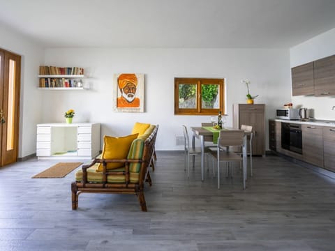 Room, Furniture, Floor, Interior Design, Property, Living Room, Yellow, Building, Table, Flooring