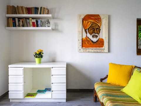 Property, Furniture, Picture Frame, Green, Shelf, Couch, Orange, Interior Design, Yellow, Bookcase