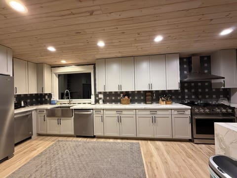 Huge kitchen with gas range and additional 30 inch oven