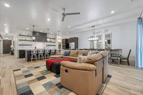 Living, kitchen, and dining area are open to each other and allow people to gather easily