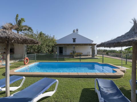 Water, Building, Plant, Sky, Property, Swimming Pool, Azure, Shade, Window, Outdoor Furniture
