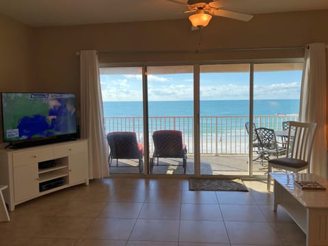 Beachfront Living Room overlooking Indian Rocks Beach - Indian Rocks Beach Is Visible From The Living Room and Kitchen Of This Top Floor Condo!