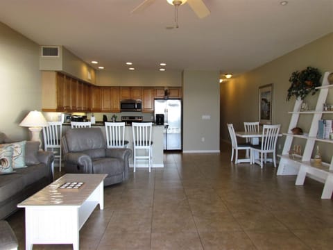 Comfortable Living Room Seating In Front Of The Flat Screen TV a - Comfortable Living Room Seating In Front Of The Flat Screen TV and Right Next To The Beachfront Balcony.
