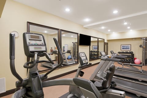Break a sweat on modern fitness equipment while staying motivated in a bright space.