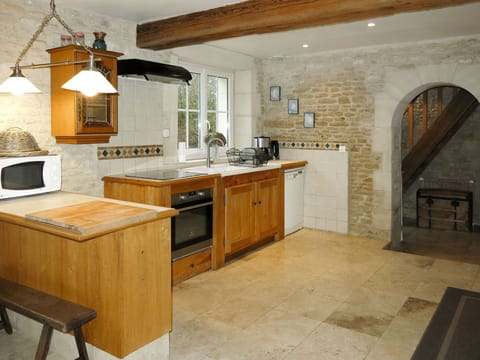 Countertop, Cabinetry, Property, Furniture, Kitchen, Kitchen Appliance, Drawer, Kitchen Stove, Home Appliance, Lighting