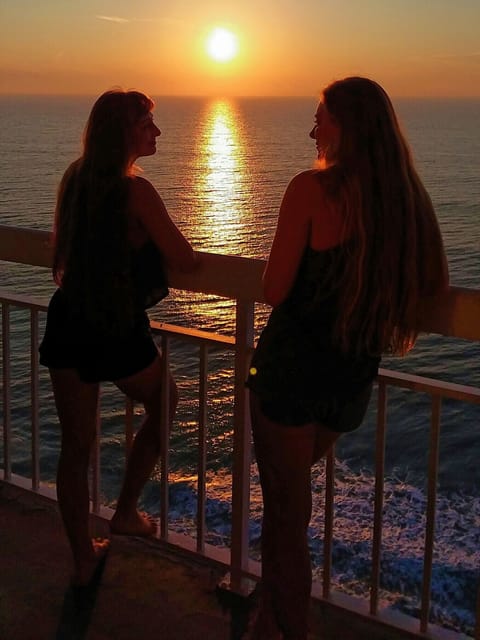 Our daughters, enjoying a warm sunrise morning.