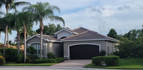 6768 Del Mar Terrace, front of house, 2 car garage, great landscaping.