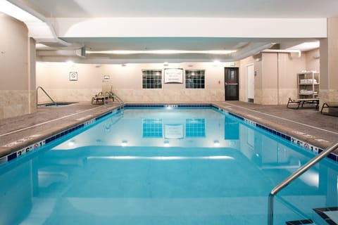 Dive into relaxation in this inviting indoor pool. Perfect for a refreshing swim anytime.
