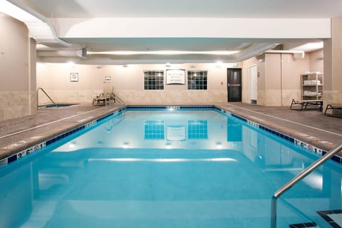 Dive into relaxation in this inviting indoor pool. Perfect for a refreshing swim anytime.