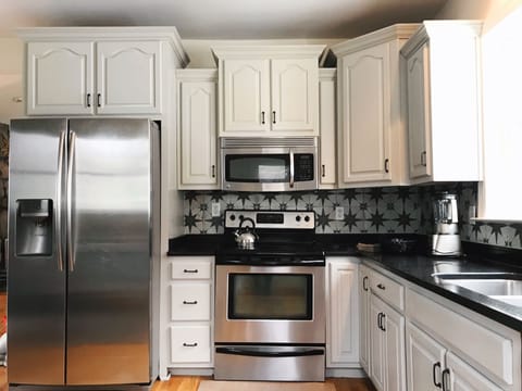 Full sized family kitchen for all your needs during your stay.
