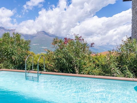 Water, Cloud, Sky, Property, Plant, Swimming Pool, Azure, Natural Landscape, Vegetation, Body Of Water