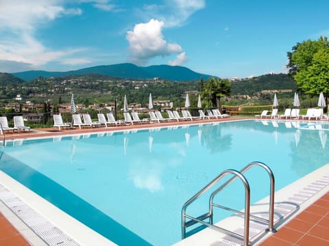 Water, Sky, Cloud, Swimming Pool, Blue, Azure, Building, Outdoor Furniture, Tree, Chair