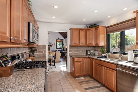 Kitchen looking into living room
