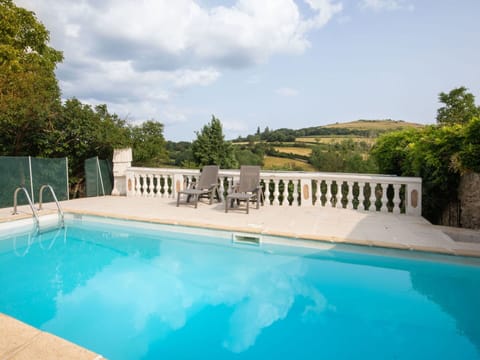 Water, Sky, Plant, Property, Swimming Pool, Azure, Shade, Outdoor Furniture, Sunlounger, Tree