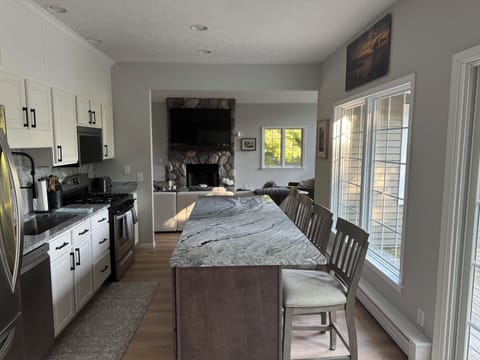 Newly renovated kitchen with views of Glen Lake.