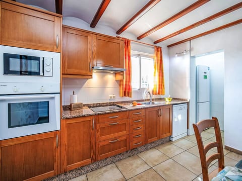 Kitchen, Wood, Furniture, Countertop, Flooring, Major Appliance, Cabinetry, Interior Design, Kitchen Appliance, Home