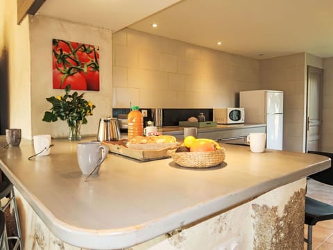 Countertop, Interior Design, Flooring, Furniture, Kitchen, Kitchen Appliance, Floor, Lighting, Ceiling, Cabinetry