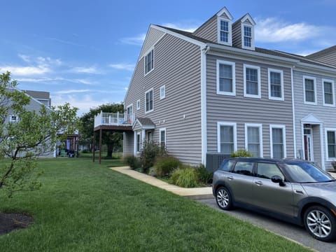 Front entry, two dedicated parking spots with a third adjacent visitor space.